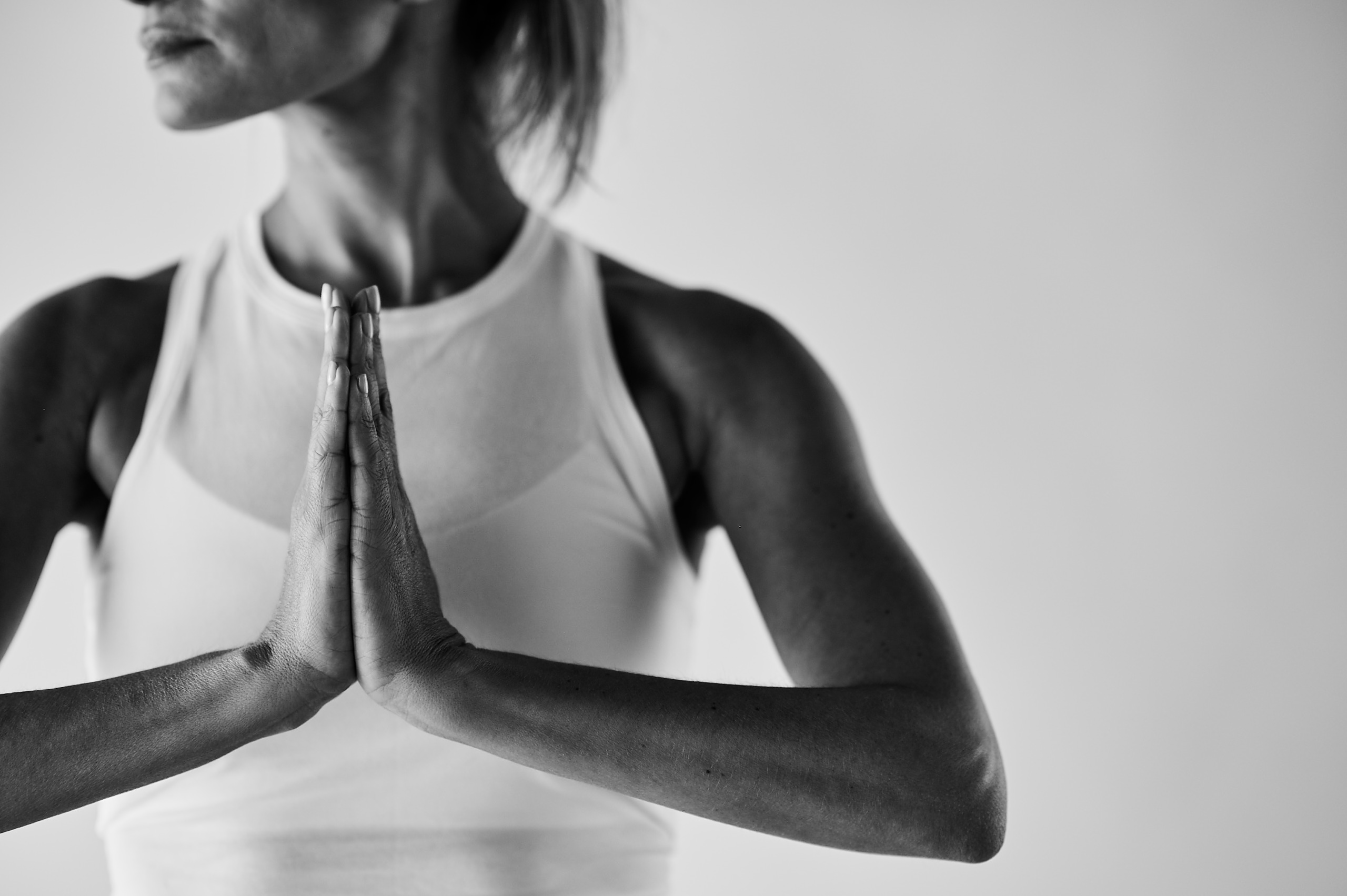 Barre client hands in prayer position